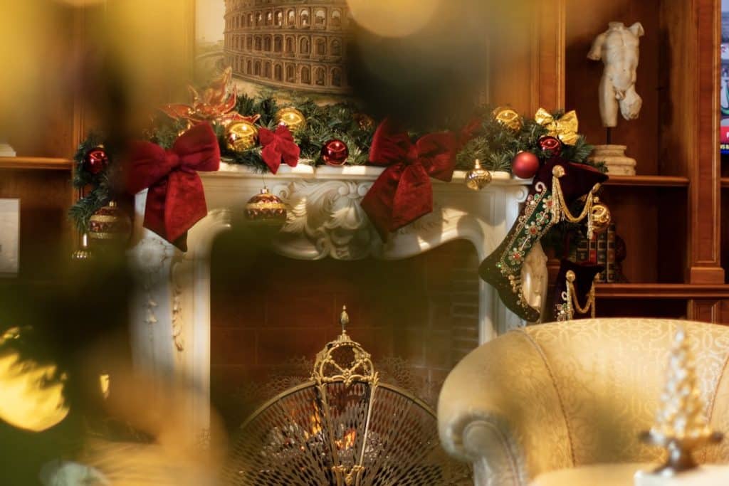 Fireplace mantel with holiday decorations in the Rome Cavalieri, a Waldorf Astoria hotel